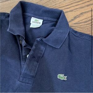 Lacoste polo fits a S